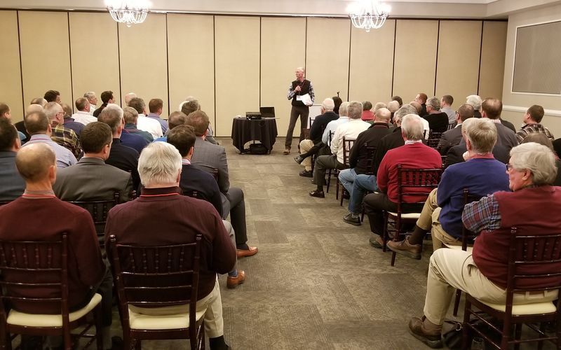 Steve Rose Master of Ceremonies addressing 100 Men Who Give a Damn