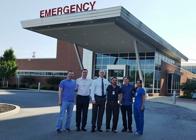 The first group of SEBH EM PGY1 residents outside the Emergency Department: (left to right) Charles Farrell, D.O., Brett Davenport, D.O., E. Reed Morgan, D.O., Benjamin Miner, D.O., Craig McDonough, D.O., and Valerie Posada, D.O.