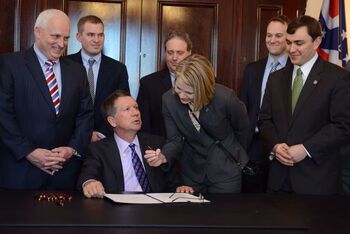 Dr. Joan Papp at the signing of HB 170