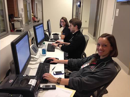 Alexis Hausfeld, MD, EM-IM PGY2; Ben Wallace, DO, EM PGY3; and Meghan Jones, MD, EM PGY2 working in the New ED at the Team Station