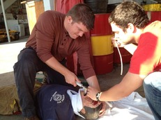 Residents, Drs. Andrew Little [left] and Zachary Hudson [right] at EMS extraction day, intubation station