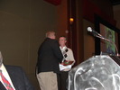 Tim Saunders receives Interity Award from Jerry Snodgrass